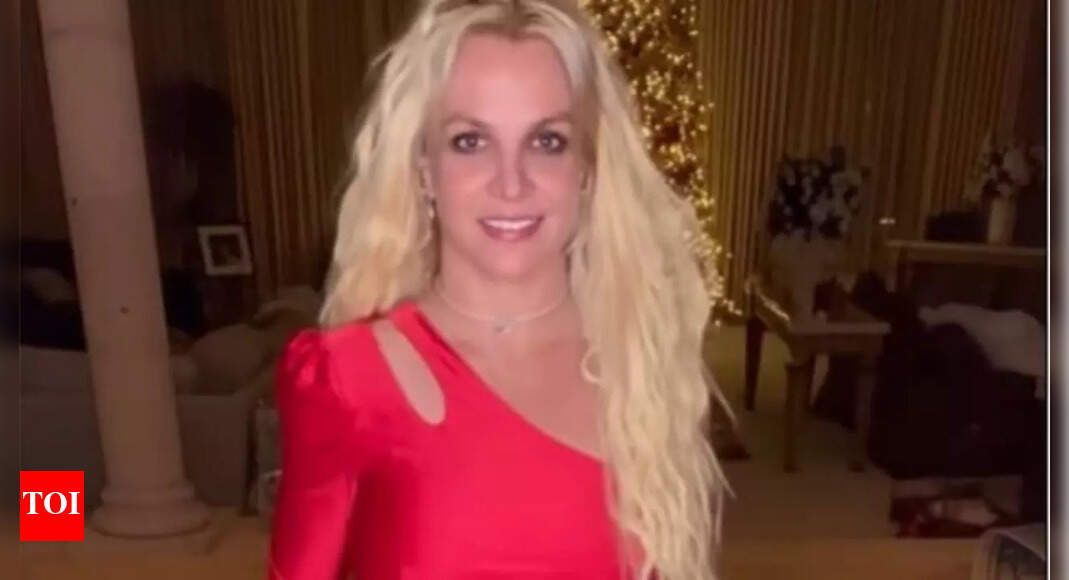 Britney Spears gets in holiday mood, wears red cutout dress English