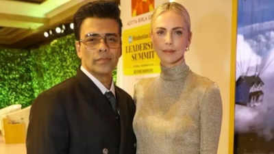 Karan Johar strikes a pose with Charlize Theron, Bollywood celebs shower love on the duo