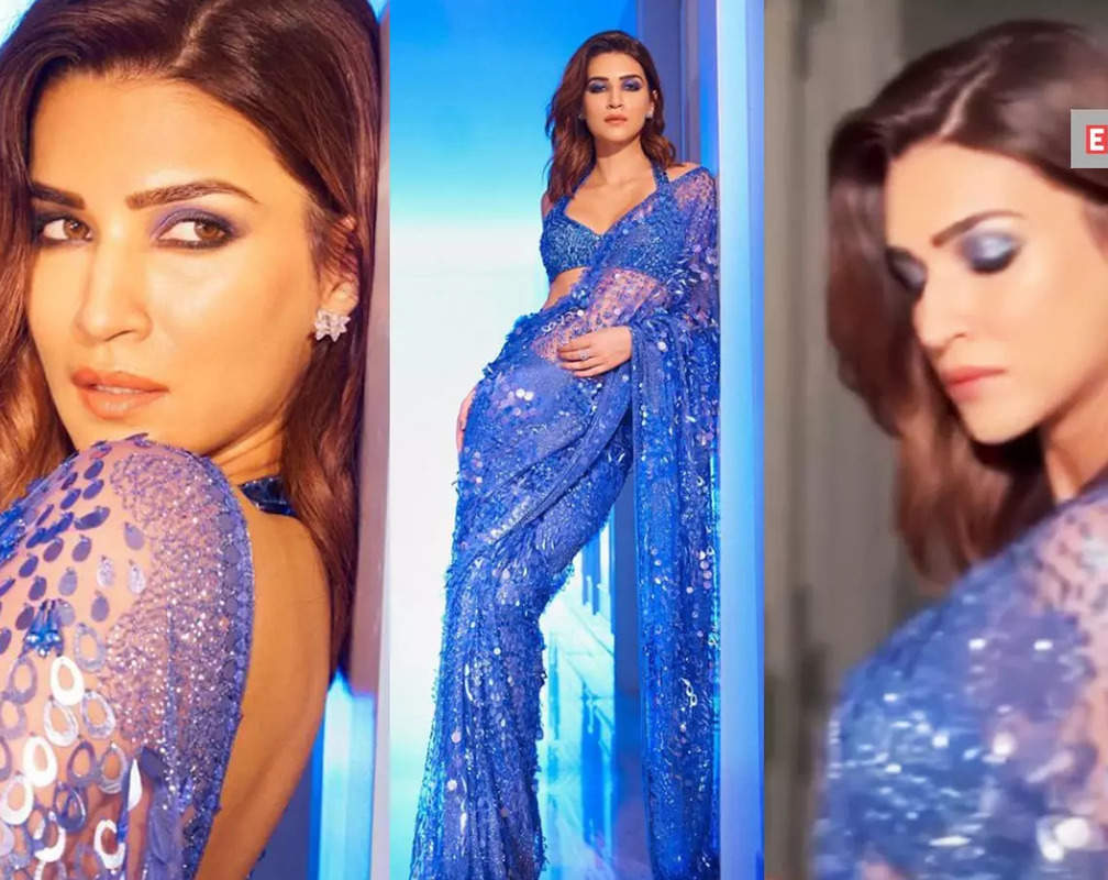 
Kriti Sanon dazzles in a shimmery blue saree; fan calls her 'Param sundari'
