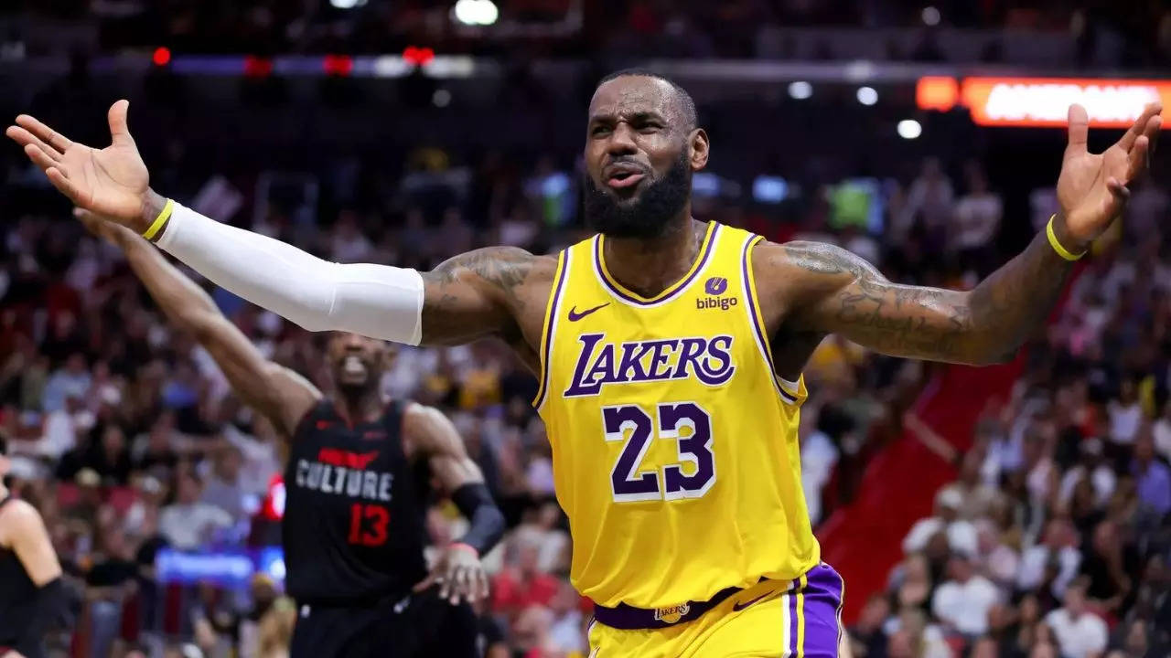 Los Angeles Lakers coach Darvin Ham and LeBron James express
