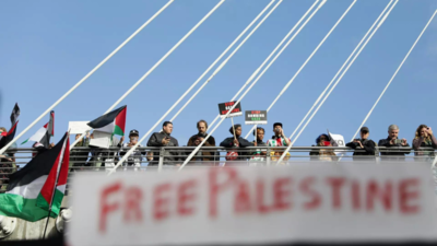 Three pro-Palestinian protesters deny committing terrorism offences at