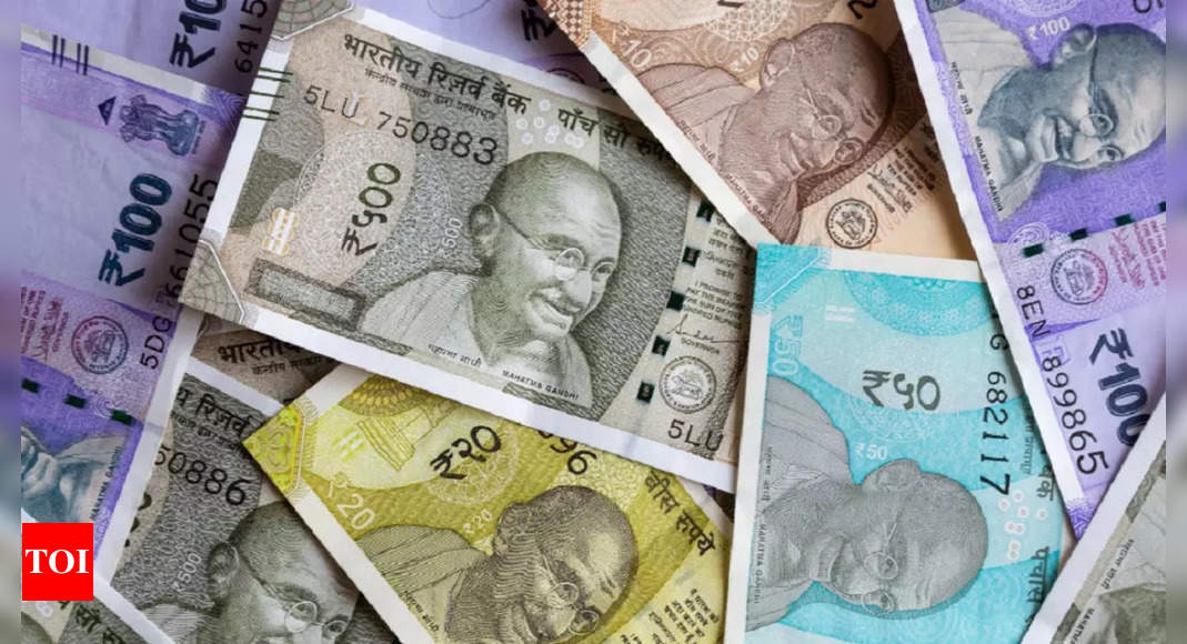 Rupee logs new low amid trading glitch – Times of India