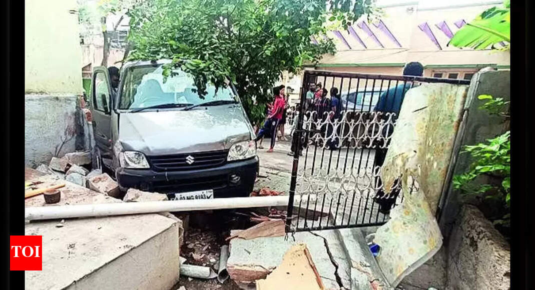 Drunk man rams minivan into woman | Bengaluru News - Times of India