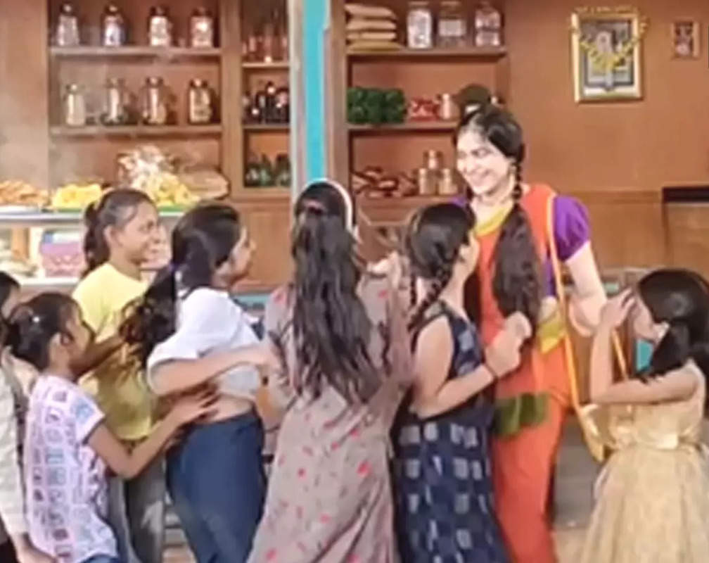 
Adah Sharma dances with kids in front of a sweet shop in her latest video
