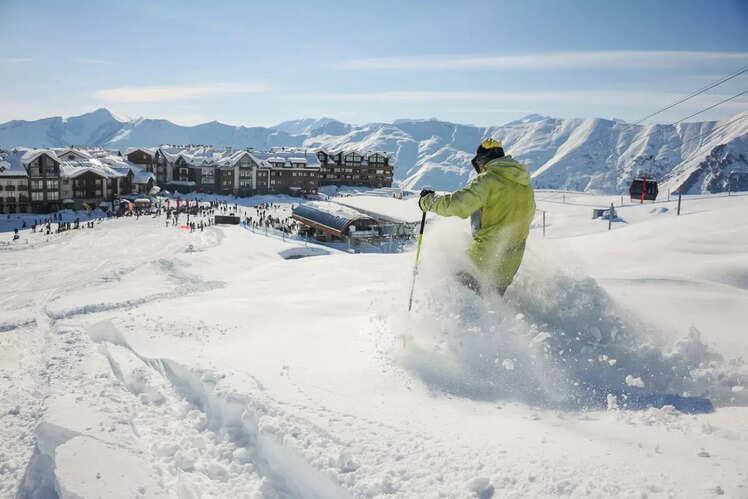 Try skiing in the Swiss Alps, Switzerland