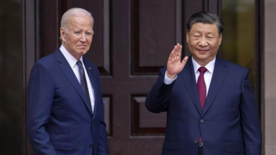 Asian shares wobble and oil prices fall after Biden's meeting with China's Xi