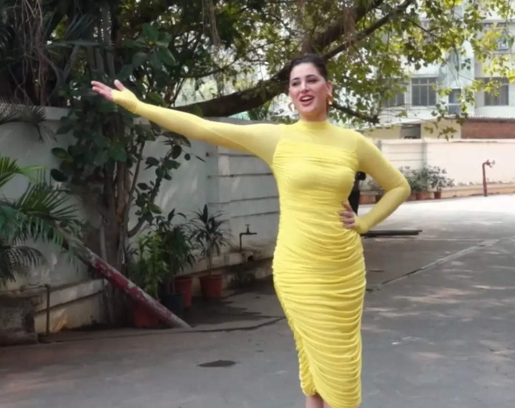 
'I am bringing you the sunshine': Nargis Fakhri steals the show in her vibrant yellow outfit
