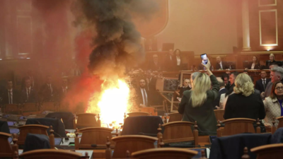 Fire, smoke bombs lit by opposition in Albanian parliament