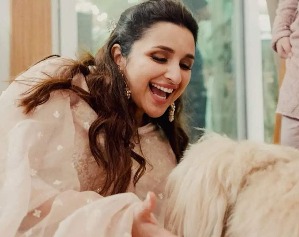 
Parineeti Chopra shares a set of photos donning a pink suit at her 'sasural'; spends time with her furry friend
