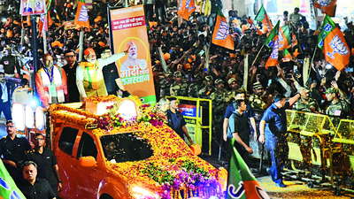 Modi Roadshow: Walled City turns saffron as Modi holds roadshow ...