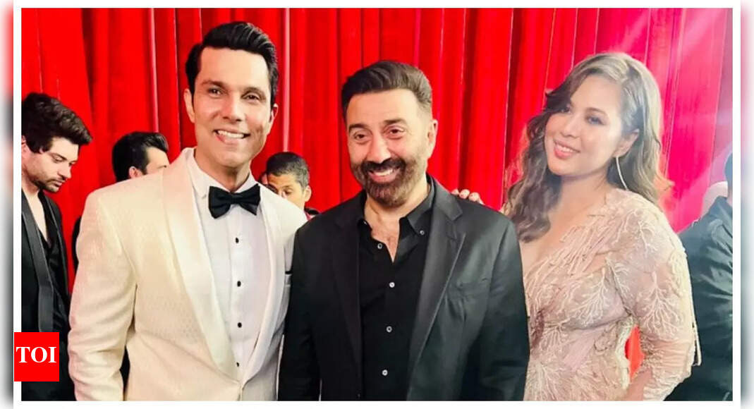 Sunny Deol strikes a pose with to-be husband and wife Randeep Hooda and Lin Laishram at an event – See photos | Hindi Movie News – Times of India