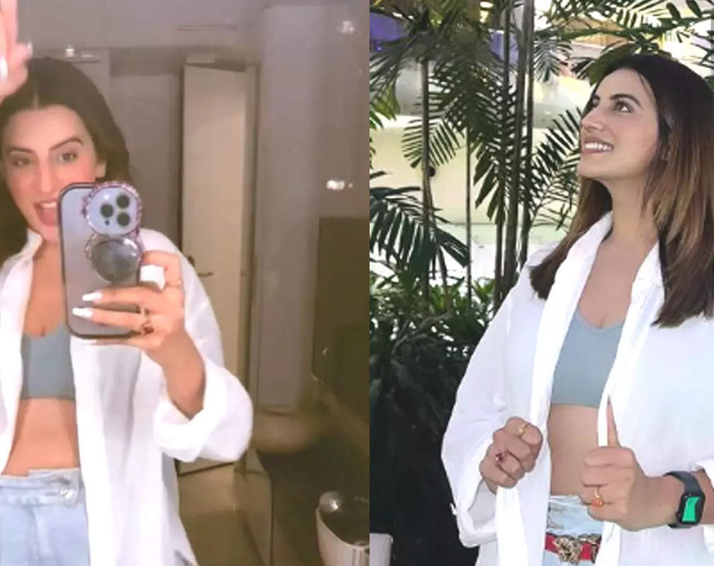 
Akshara Singh grooves to 'Dil Dooba' in an unbuttoned white shirt and distressed denims

