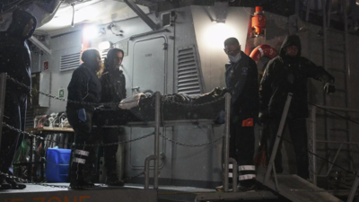 12 crew members are missing, 1 dead after a cargo ship sinks off a Greek island in stormy seas