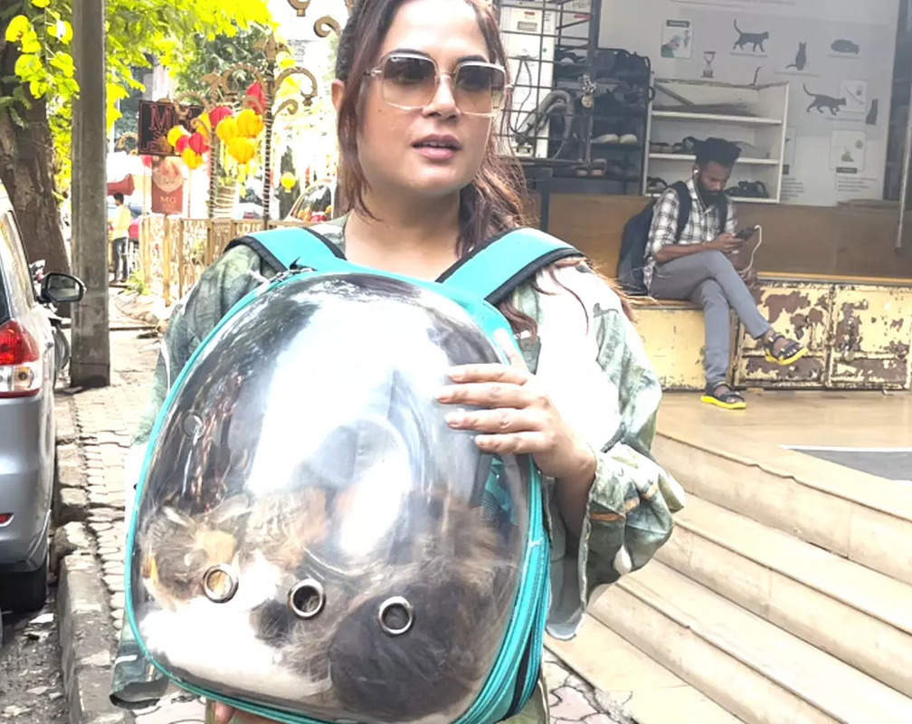 
‘I have 2 cats', says Richa Chadha as she poses with her pet friend outside a clinic
