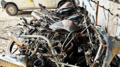 Trio ransack showroom in Narhe, set 12 vehicles ablaze