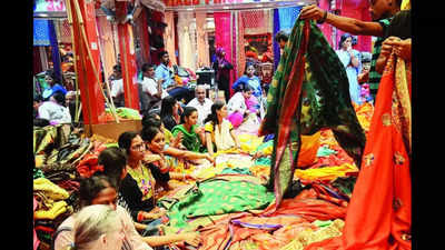Women on sari-buying spree for nieces to 'ward off' bad times