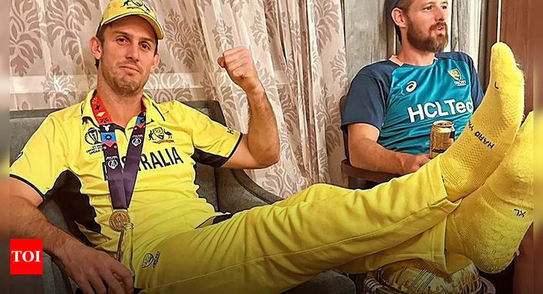 Mitchell Marsh 'won't mind repeating' the controversial act: Feet on World Cup trophy | Cricket News - Times of India