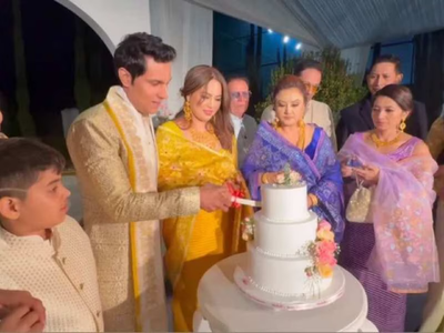 Randeep Hooda and Lin Laishram dazzle in ivory and gold at their first wedding reception - watch video