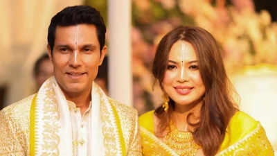 Randeep Hooda, Lin Laishram drop NEW pictures from their wedding festivities as the couple glows in yellow - See Pics