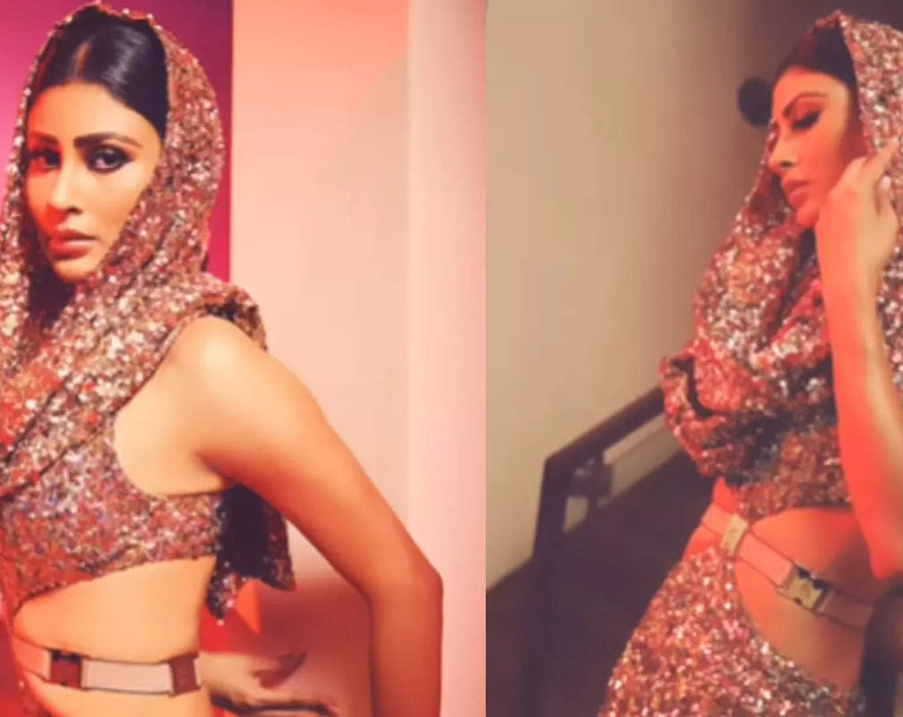 
'Take the drama one notch down Juliet', exclaims Mouni Roy as she stuns in a golden hooded cutout gown
