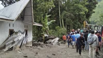 Two dead, 10 missing after Indonesia floods and landslide