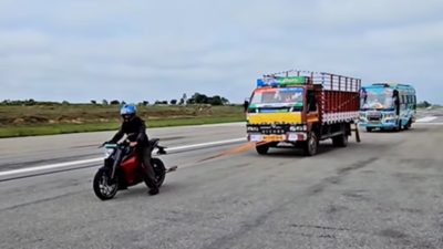 Ultraviolette F77 electric motorcycle pulls truck & bus weighing 15,000kg with ease!