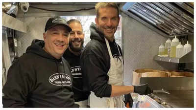 Bradley Cooper serves cheesesteaks at food truck in New York City