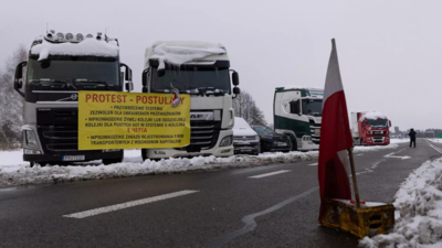 Ukraine moves trucks over Polish border by train to bypass blockade