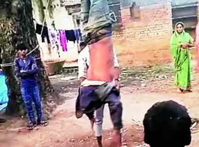 Man Hung Upside Down Man Tied To Tree Upside Down Thrashed On Suspicion Of Mobile Theft