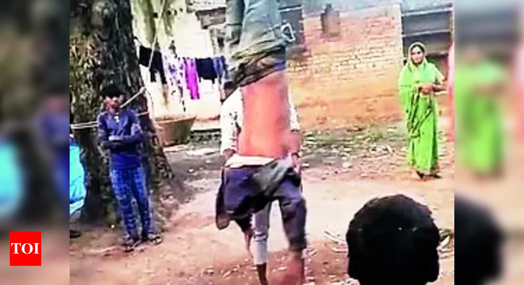 Man Hung Upside Down Man Tied To Tree Upside Down Thrashed On Suspicion Of Mobile Theft