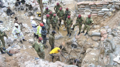 Rescuers have recovered 11 bodies after landslides at a Zambia mine. More than 30 are feared dead