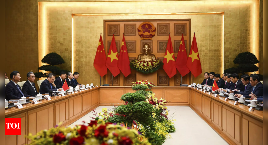 China, Vietnam hail strategic upgrade of ties - Times of India
