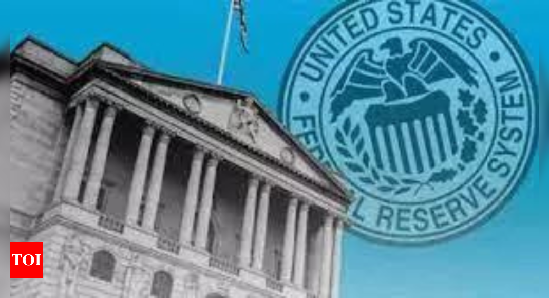 US Fed holds key lending rate steady, signals cuts in 2024 – Times of India