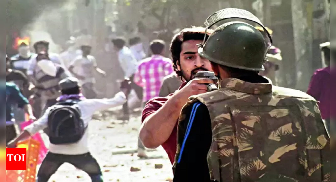 NE Riots: Ne Riots: Bail Plea Of Man Who Pointed Gun At Cop Rejected ...