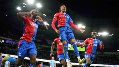 Late penalty rocks Man City as Palace hold champions