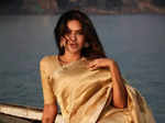 Esha Gupta is a queen of ethnic fashion in season's favourite trend, the gold silk saree
