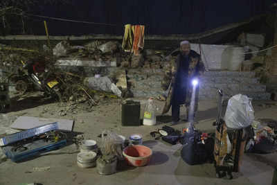 China has started erecting temporary housing units after an earthquake destroyed 14,000 homes