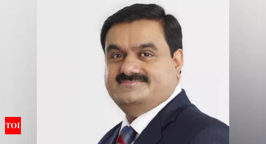 Adani family plans bn investment in green unit – Times of India