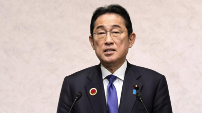 Japan approves record $56 billion defence budget
