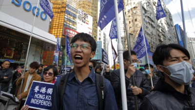 Hong Kong democracy advocate seeks asylum in Britain