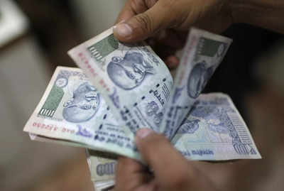 Rupee declines 11 paise to settle at 83.32 against US dollar