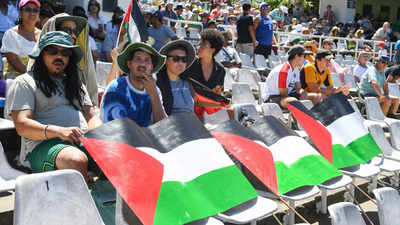 Pro-Palestine supporters raise slogans outside Newlands against SA U-19 skipper