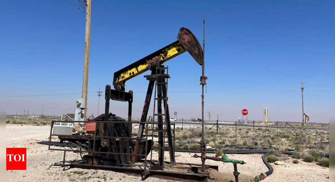 Oil slides as Saudi price cuts counter Middle East worries – Times of India