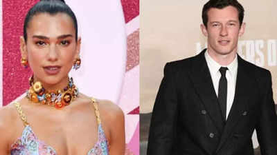 Dua Lipa and Callum Turner fuel speculation of a romantic relationship as they are spotted dancing together at a party