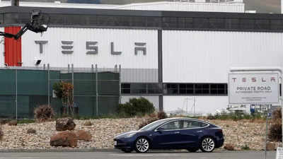 Tesla workers get pay hike signal amidst UAW push for unionization