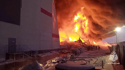 Huge fire engulfs warehouse in Russia outside the city of St Petersburg