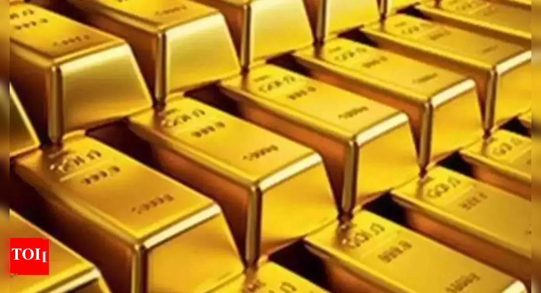 Gold rises as safe-haven demand, rate cut bets keep prices elevated – Times of India