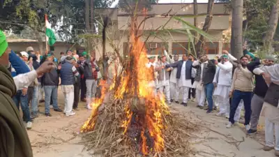 Demanding hike in price, BKU workers burn sugarcane in protest