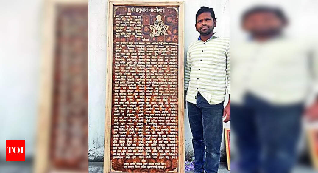 Hanuman Chalisa Ganjam artist’s labour of love Hanuman Chalisa on wood Bhubaneswar News