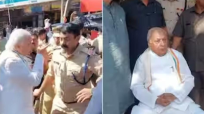 Kerala governor Arif Mohammad Khan shown black flags, stages protest on roadside